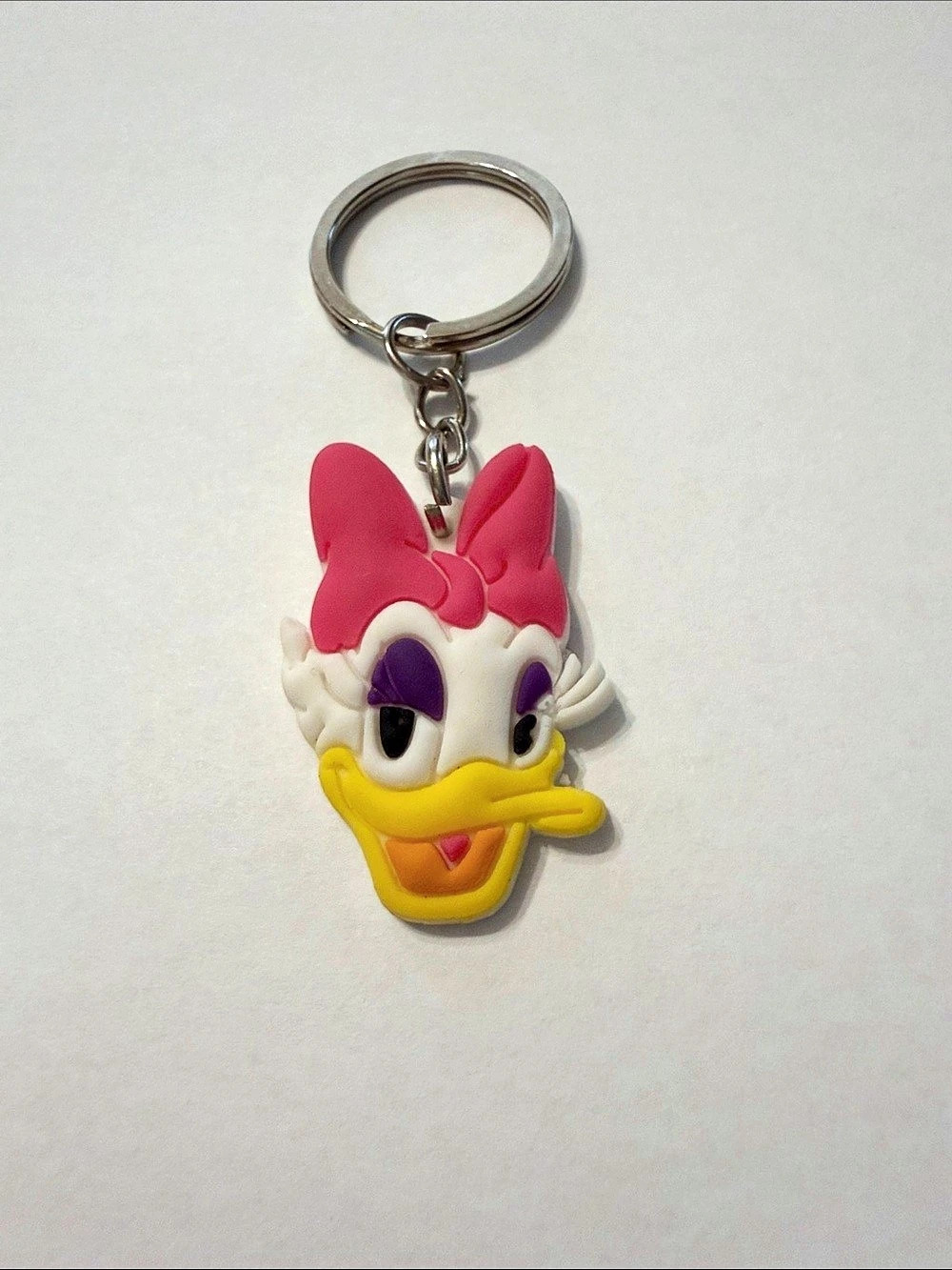 Disney Daisy Duck Rubber Face Keychain in Pink & Yellow